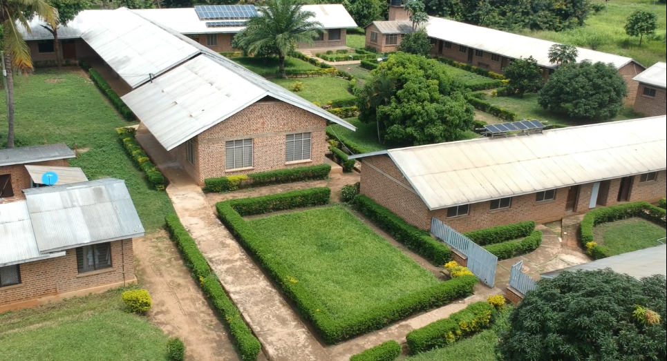 Group photo of graduates with their teachers